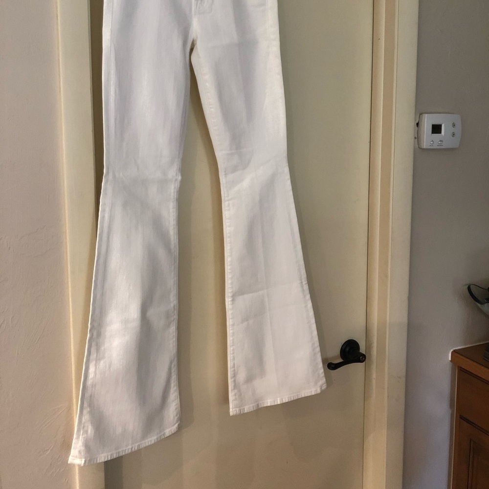 COPY - White bell bottom white jeans never worn.
